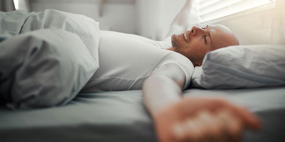 Person sleeping in bed