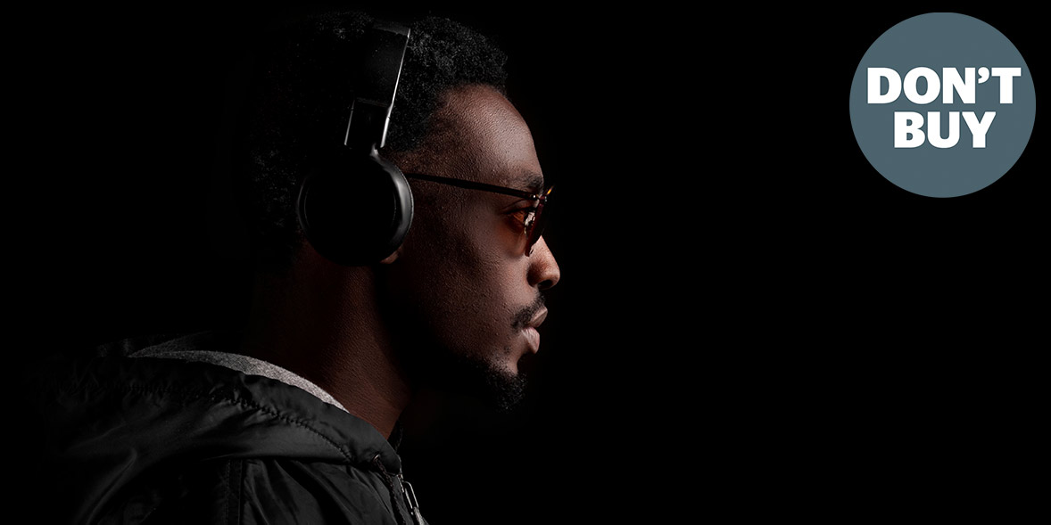 Profile of a man wearing sunglasses and headphones, with a dark background and the text "DON'T B" in the upper right corner.