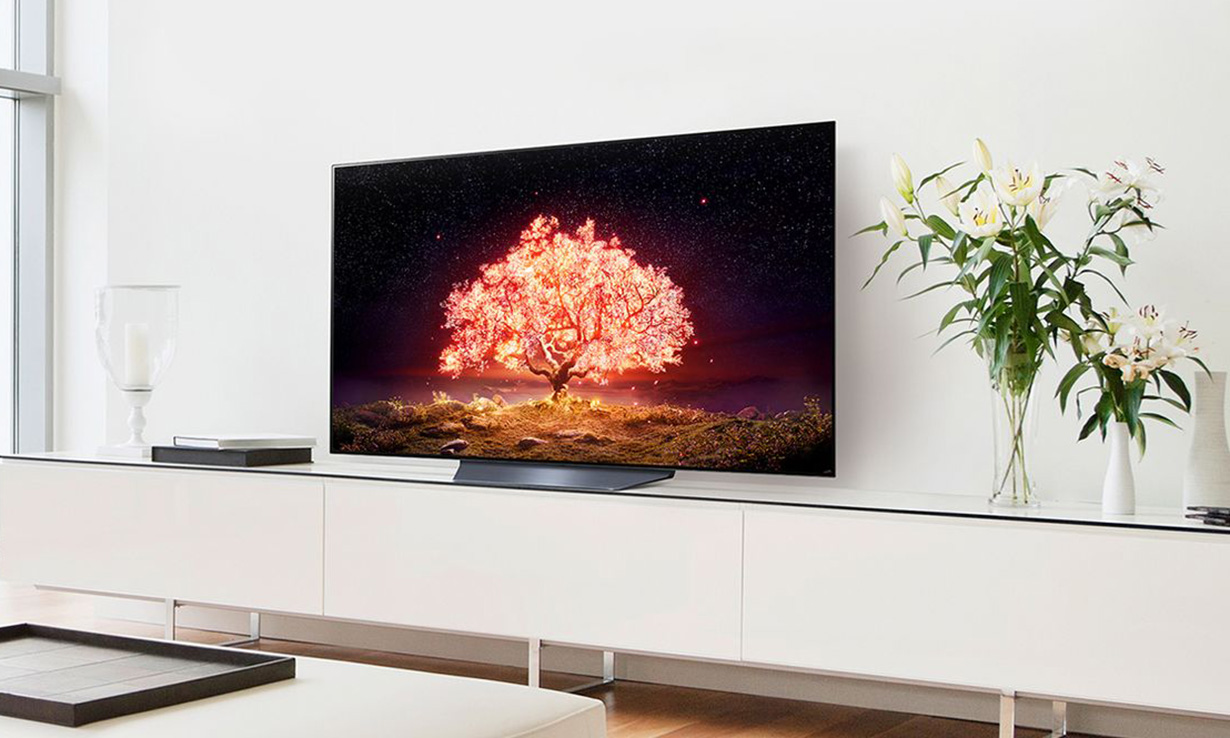 A modern living room featuring a large TV